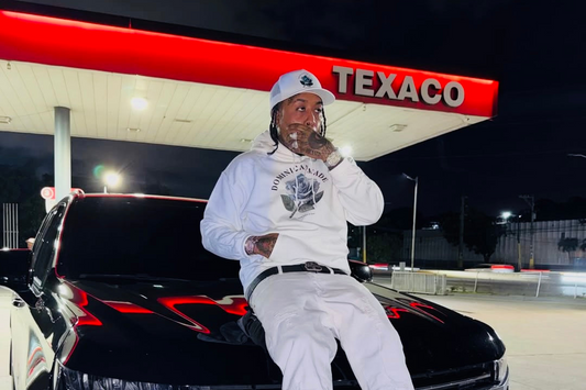 Kaly Ocho wearing Dominican Made 2000 Pesos Dominicano Rose Collection